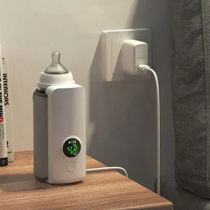 WarmEase™ Draagbare Babyflessenwarmer | Altijd de perfecte temperatuur, waar je ook bent